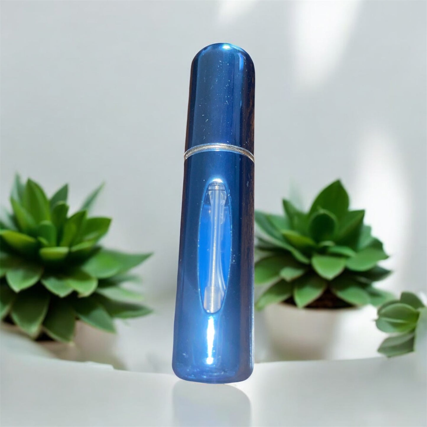 Mini Vaporisateur de Parfum Rechargeable – Format Voyage